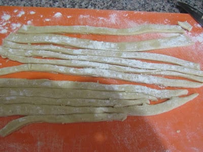 Strips of dough cut out for making 